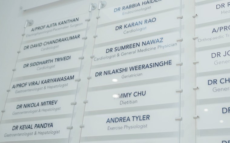 Practitioner board at Complete Health Australia, Rouse Hill, listing A/Prof Viraj Kariyawasam, Gastroenterologist and Hepatologist
